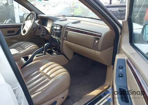 2000 Jeep Grand Cherokee Limited from USA, damaged, VIN 1J4GW58N1YC328199